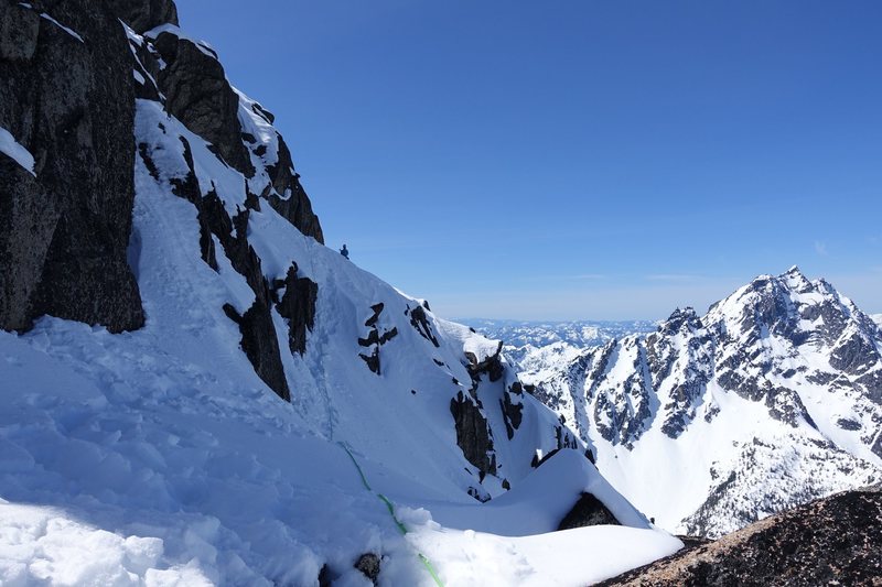 Trending right on steep snow of the NW Face easily leads to the summit with a short 4th class rock step