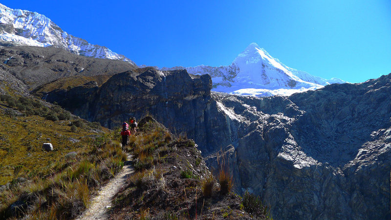 Hiking along the trail above Laguna Paron toward the south face of Artesonraju.