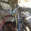 The South Face rappel off of the big tree. Tat nest includes: old rope with lichen growing on it, steel cable, rusty rap rings, a quicklink, and a biner. Bomber. We leave this nest as an historical marker, some of it probably associated with the FA party. 