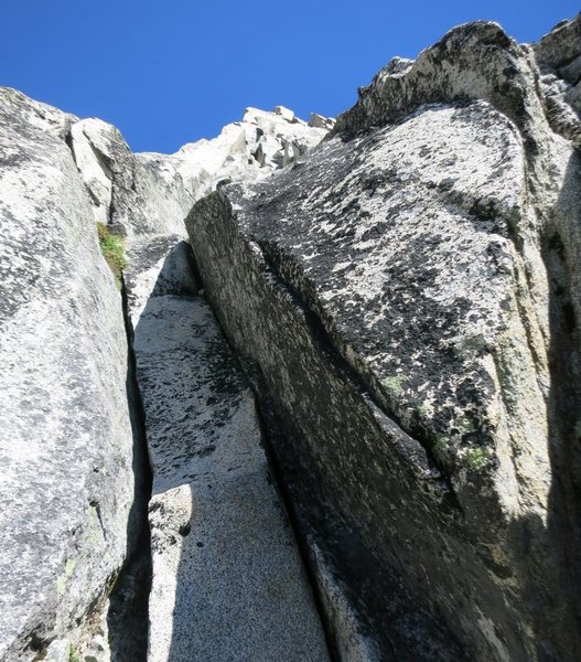 I suspect this is the 10+ crack (60-70' into P2) that Erroneous & co climbed. We went right at this point instead of climbing the crack.
