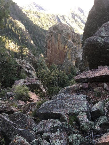 The view from the notch on the ridge, above the ledgy couloir, of the Cake and Candle - Candle is the spire in the foreground, Cake the larger heap behind it.