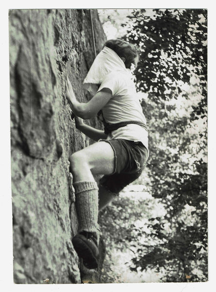 Climbing on the center portion of Nubbin Face blind-folded and against the clock circa 1968-69?. Shoes are "RR" (Royal Robbins, shorts by scissors and Levi Strauss. I am the person in the photo, but i do not recall if the photographer was Richard E. Milller, Dennis Grabnegger, or Joe Ebner. (it's been a while, and i was blind-folded) just something to pass the time when traffic jams occurred on more serious routes and/or when the route that was of interest to you was unavailable for whatever reason. it was fun. Guessing, it was 5.2 or 5.3 in difficulty, and still probably is, even blind-folded; but you did have to change your approach to route finding!
