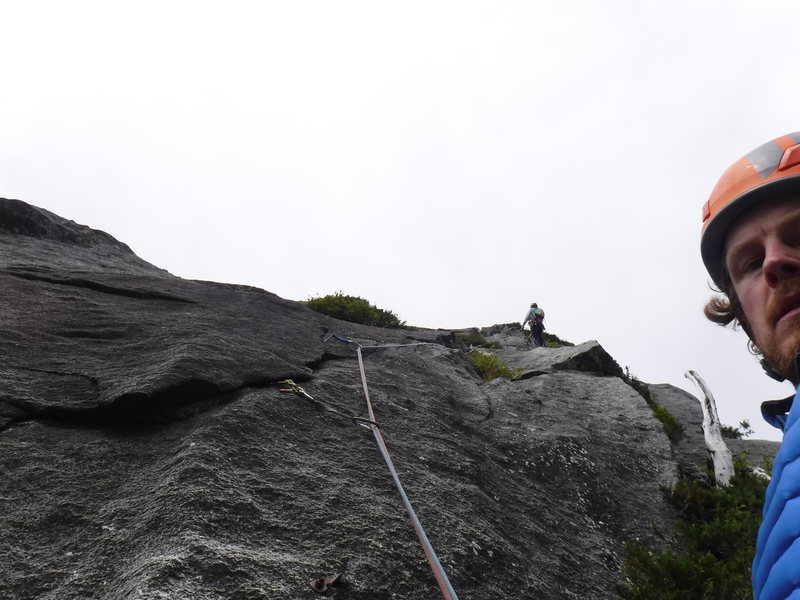 Passing the old anchors, stoked for the 5.10+ finger crack ahead on pitch 6.