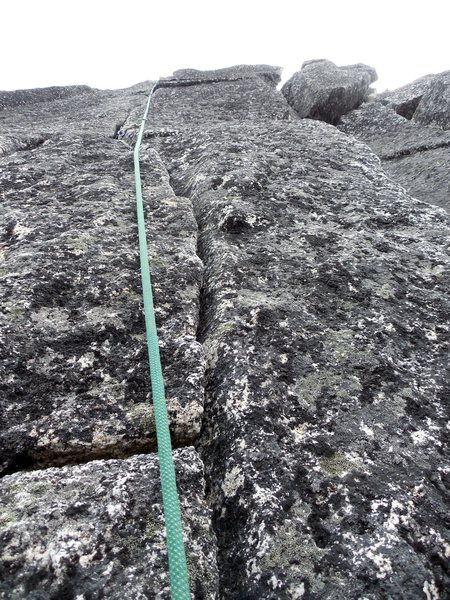 somewhere on route. lichen crack climbing.
