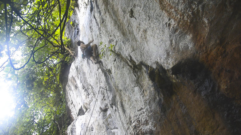 Pulling the crux on the FA of The Wild Frontier