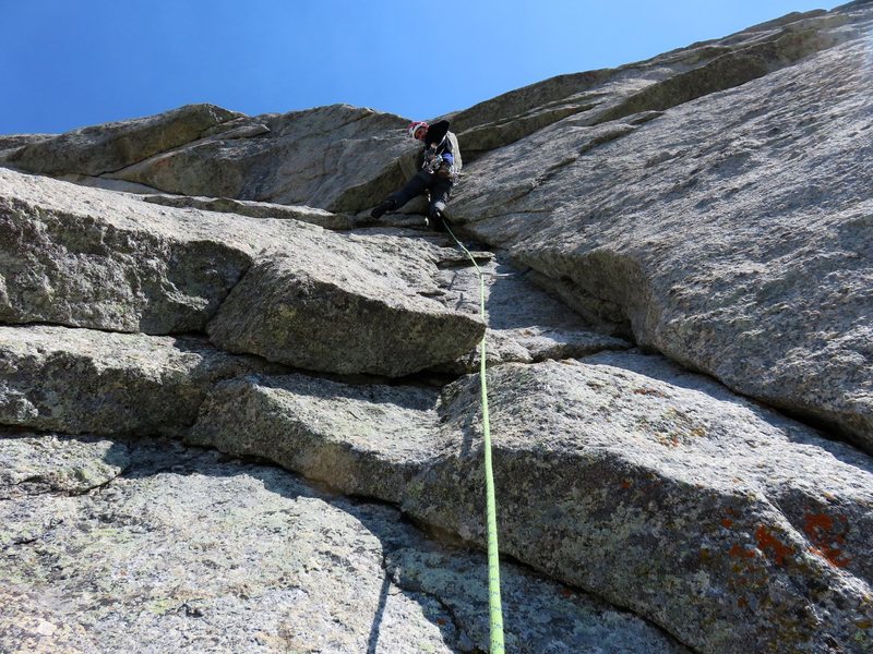 Pitch 6. In the photo Jeff is at the small bulge that enters the right-facing corner. This is the first crux of the pitch, but is protectable and more of a powerful move than difficult.