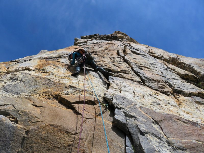 Sarah leading Pitch 4. She took the direct start which is one of the 5.8 variations to the start (I think the original route goes left around the arete a bit according to the route description). This is a really fun pitch on steep juggy solid rock.
