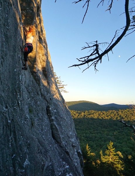 Jamie Trayer follows the last rays of the sun across the Monkey traverse. Photo: Ian Kirk