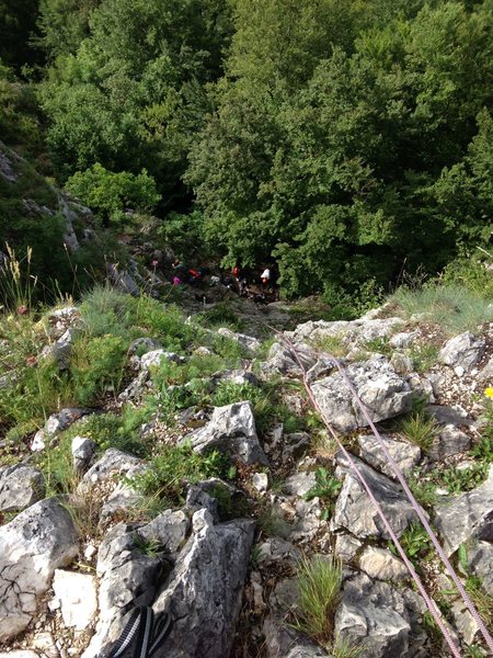 Getting ready to rap down from the belay. a 60m rope will fall about 2 meters short so you'll need to down climb