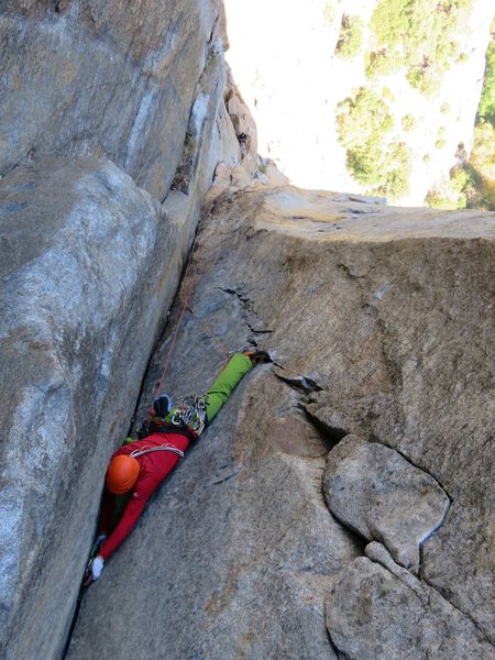 Pitches 6-8. A climber nearing the top of the first pitch in the corner (this would be midway through Pitch 7 on the SuperTopo). He also belayed where we did, although he had to take a hanging stance until we vacated.
