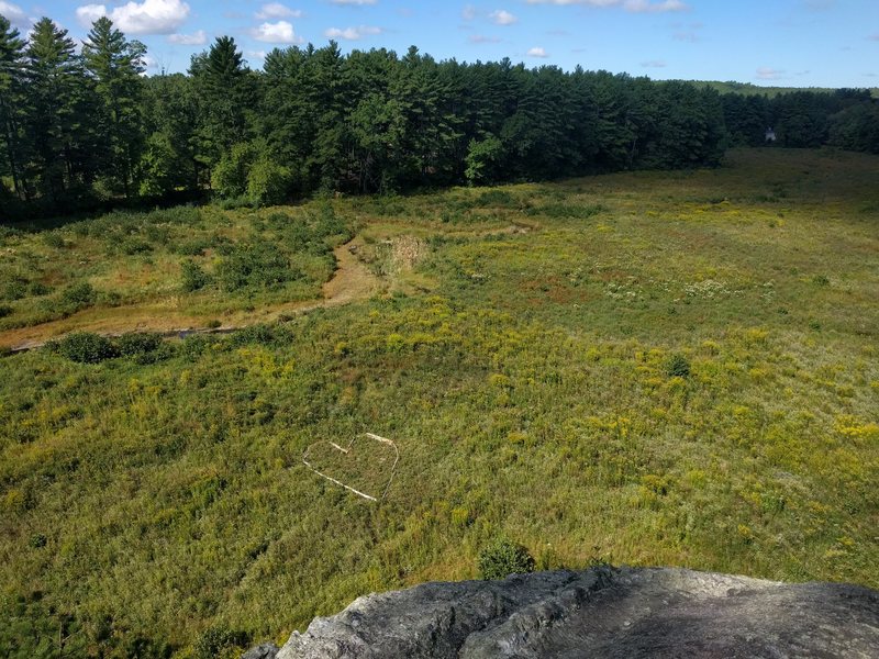 From the top of the main cliff - former lake is now a very scenic meadows with a stream through it, with love