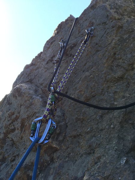 Second pair of bolts on the Northeast face. Bolt on left is loose, so I slung the horn of rock with some cord just in case.