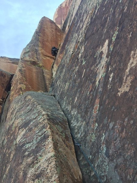 Sam leading handcrack pitch with thrutching 11b exit. Bad rock section isn't that bad, good pro and jams.