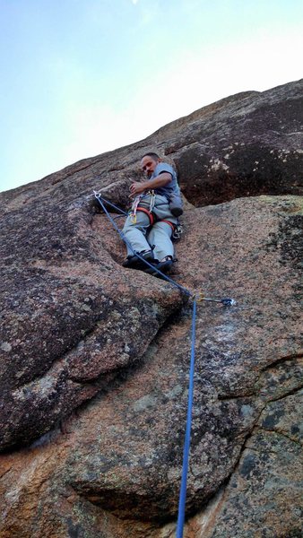 Jeremy hanging loose on the opening moves of the first ascent.