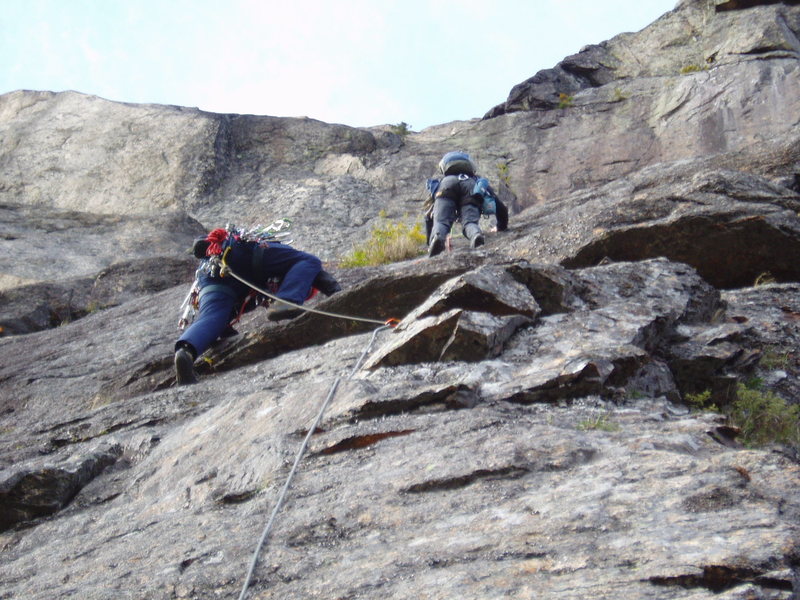 Photo#21 - SM & RW following P8 They are at the approx level of the ancient pitons, on the technical crux of the route