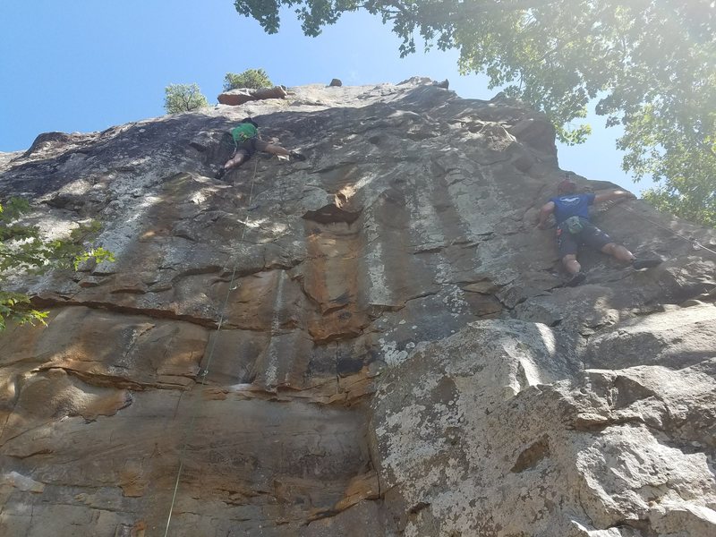 Michael is climbing Orange Crush on the right and Kevin is attacking Purple Nehi on the left.