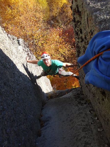 Chuck Drew working out the moves of "Stem It" 5.10d. The route was TR'ed because it is overgrown at the moment.