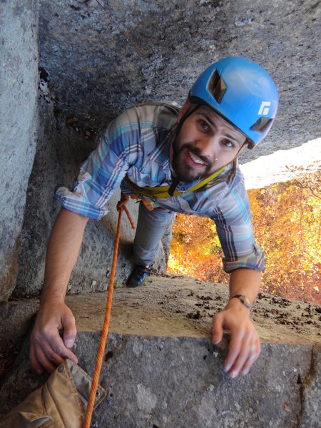 Jeremy Robichaud topping out "Stem It," 5.10d.