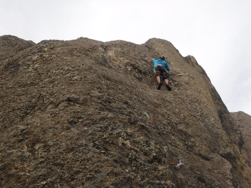 From the high saddle that splits Monster proper, start up and right on the line of bolts.