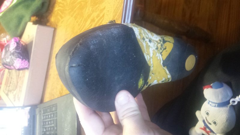 right bottom, shows small cut and side scuffs, both minor, do not affect performance as far as known.