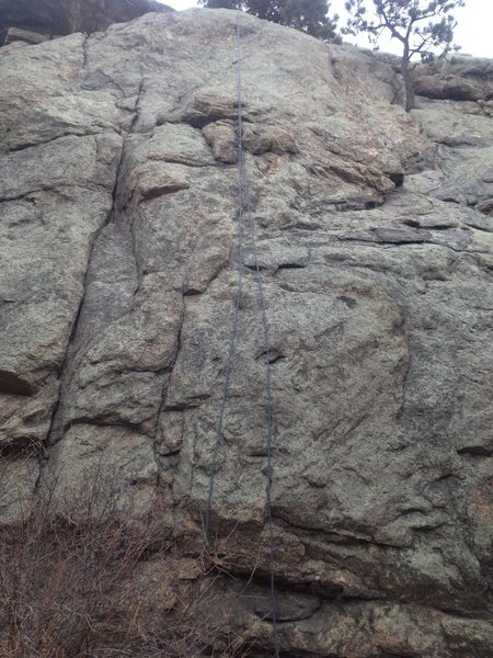 A view of the route with a rope hanging on it.