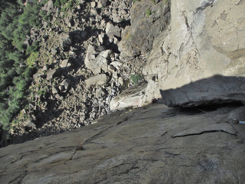 Maxime looking up P4 and contemplating the wide section up high.
