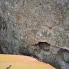 The eyes. These are the start holds, one hand under-clinging the top "eye lid" of each hueco.