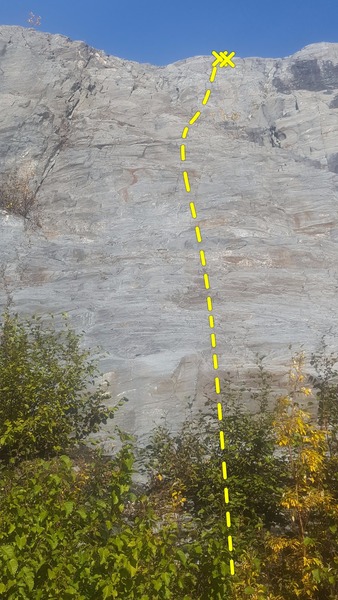 Climb up the bolt line in the center of the photo then cross a gully.  At the top clip a chain anchor on your right.