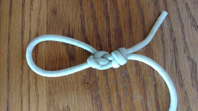 Bowline with backup knot tied directly to standing end. No Yosemite finish.