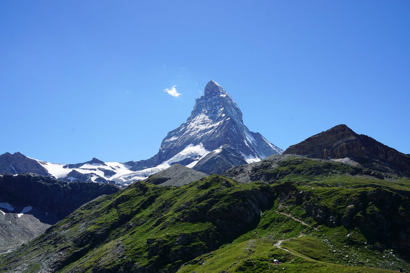 Hörnli Hut approach trail with Matterhorn towering above seen from Schwarzsee.