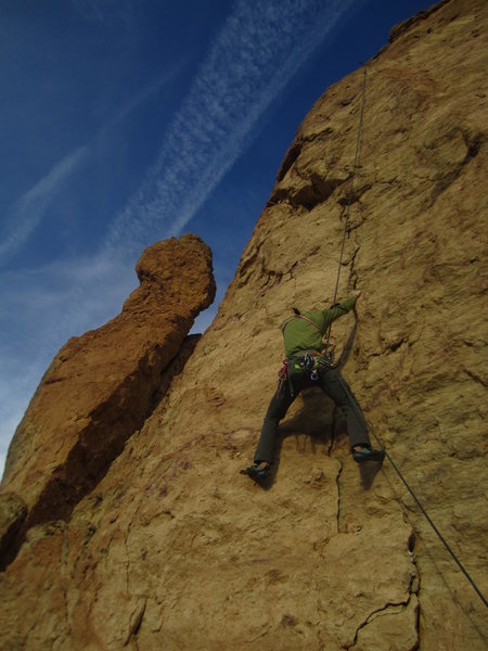 Tyler doing prep work on pitch 4. He eventually removed the flake below his right foot with a pry bar and lots of elbow grease.