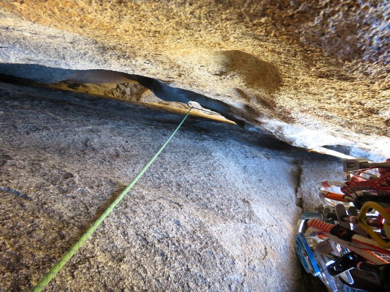 Looking down the squeeze behind the giant flake on Underpass.