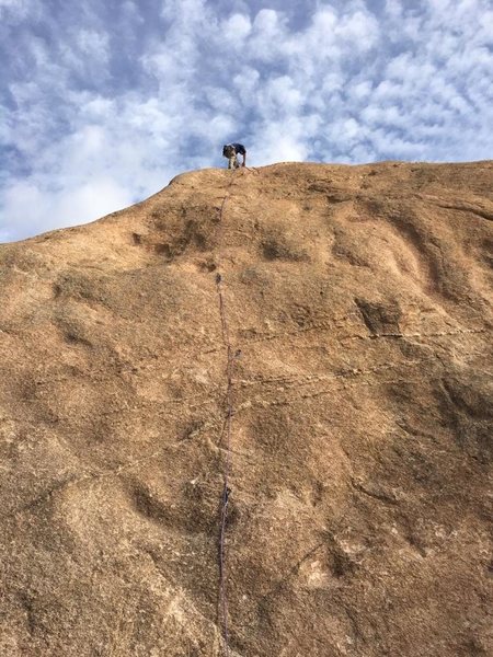 Setting up a rappell at the top of Peanut 2.