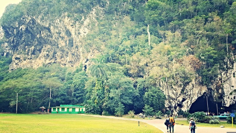Walking to the Palenque Bar with Cuba Libre wall on the left.