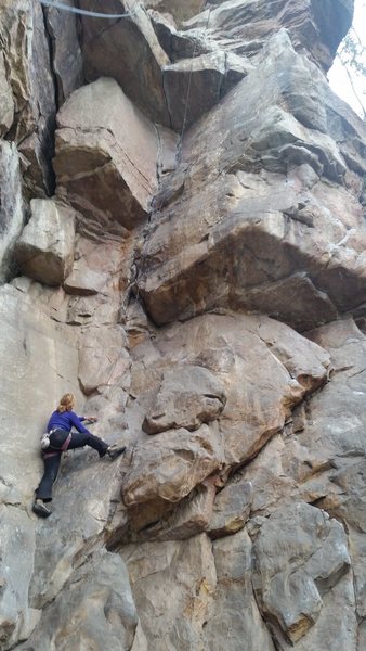 A view up Abeja. The two 5.10-ish cracks can be seen going through the large ceiling above the climber. <br>
<br>
This route is up and right from the Madonna in a large, dusty alcove (bring a rope bag or tarp).