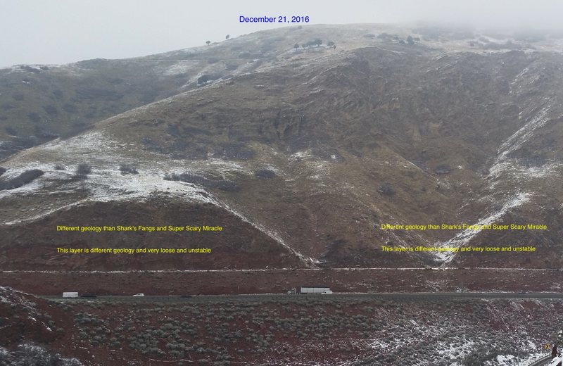 View from Grandeur Parking lot; look north across freeway. Routes high on mountain, gray band but approach is about half hour.