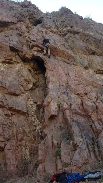 The crux move, I think. Small toe-holds, balance, and step up into the crack.