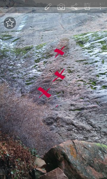 Base of the route, with the first 3 bolts marked