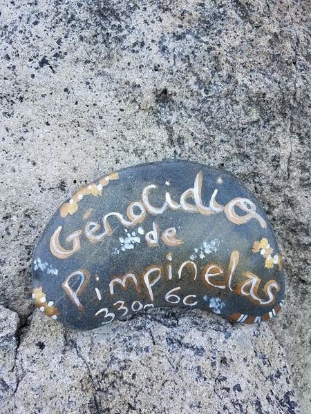 Plaque at base.