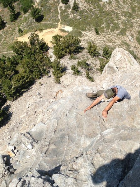 A low 5th line just to the right of the couloir on crumbly dolomite crystals.