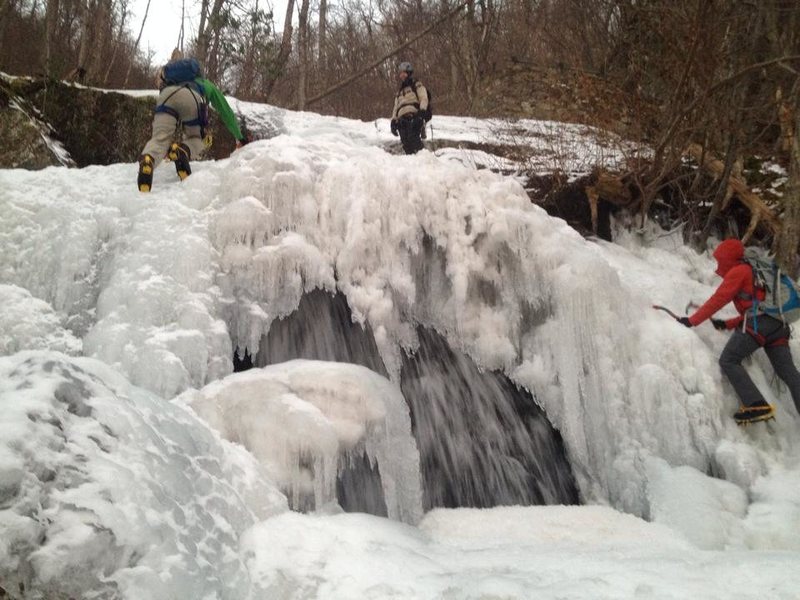 Scrambling around a window to the fall beneath the ice