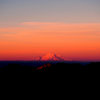 A view of Ranier on the horizon during sunrise on the approach. Credit: www.chossboys.weebly.com