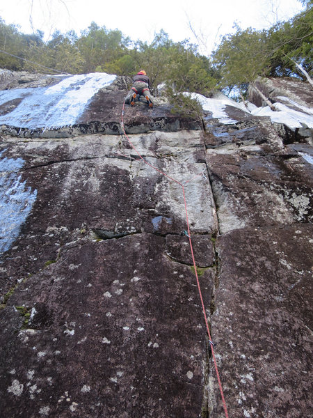 Climber on Horner-Delaney (M6).
