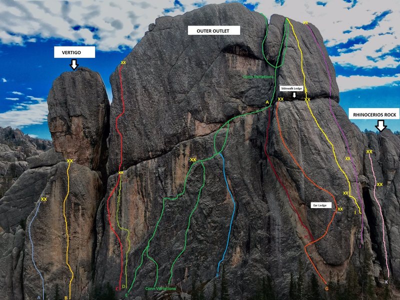 OUTER OUTLET TOPO (again may not be 100% perfect but gives a good idea of routes)<br>
<br>
VERTIGO:<br>
A.Trading War Stories 5.12<br>
B.Housing The Sin 5.13+<br>
<br>
OUTER OUTLET<br>
C.I Want Out 5.12+<br>
D.A Certain Shade of Green 5.14-<br>
E.Conn Diagonal 5.7/5.8 depending on variation<br>
F.Barry McCochiners Crack 5.10 <br>
G.Passport To The Sky 5.12-<br>
H.Nocturnal Submission 5.11-<br>
I.Stainless Steel Shield 5.11+<br>
Long Way To Heaven 5.11- ( NOT PICTURED)<br>
J.West Buttress 5.8<br>
<br>
RINOCERIOS ROCK<br>
K.Chockstone Pinnacle 5.5