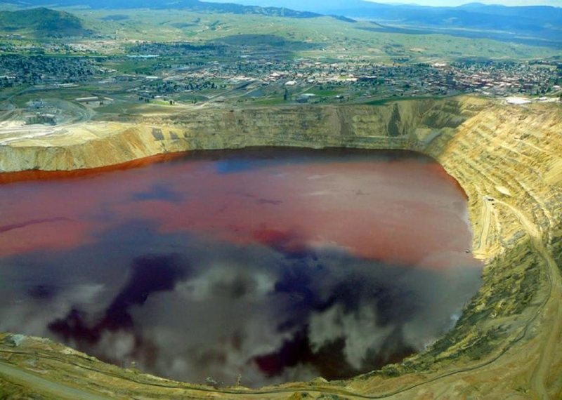 Berkeley Pit Mine in Montana with Toxic Lake you would die if you fell into. This is apparently the same as making a fleece jacket to some morons.