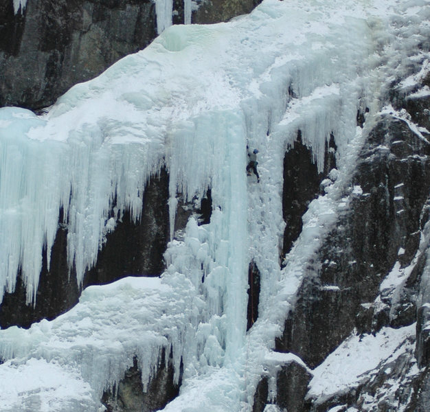 Climber on the steep central pillar (5+) of Power Play.