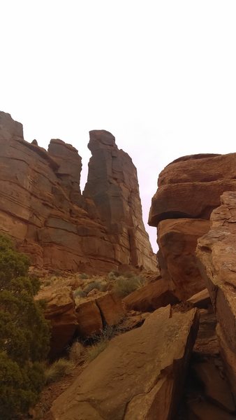 Good view of the route. 5.8 obvious chimney, crux underclings, and slab top all in view. Pitch 3 features are not so obvious in this photo.