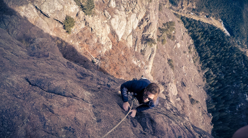 Jake Reaves climbing topping out the first pitch of the ultra classic, "Tanner Dome Classic", in February of 2017.
