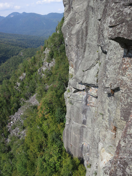 Climber on P1 of Weekend Warrior. Shows the scale of the Upper Washbowl.