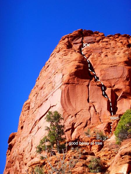 Looking up Acromegaly from the approach gully. Anchors were installed where they are because the upper varnished splitter is deceptively sketchy.